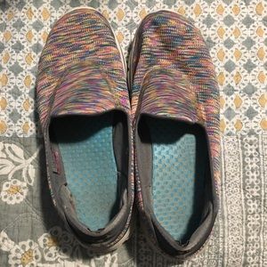 Sketchers go walk shoes.